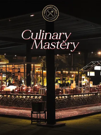 A sprawling buffet setup at night, showcasing our "Culinary Mastery" with an impressive array of dishes and elegant decor.