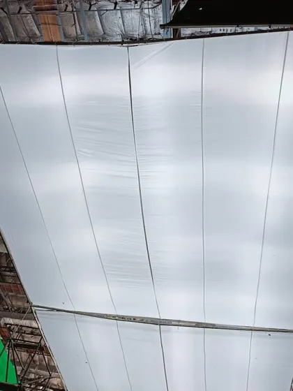 This large diffusion fabric, known as a butterfly, is stretched out to soften the light from multiple Creamsource SpaceX units. This technique is used to create a massive, ultra soft source for ambient skylight in a studio.