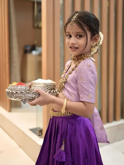 Another adorable shot of my little client, ready for the festival with her offering tray, dressed in her traditional best.