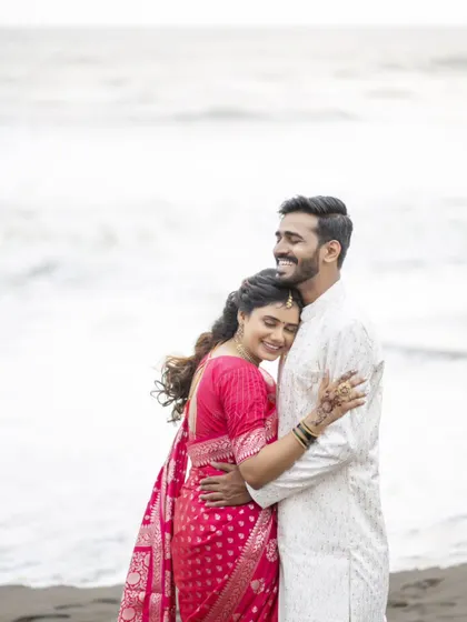 A warm embrace against the backdrop of the ocean. I aim to create images that feel both epic and deeply personal.
