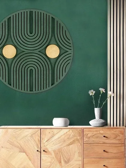 Hung above a wooden cabinet, this piece demonstrates how well it pairs with natural wood tones and other green elements in a room.