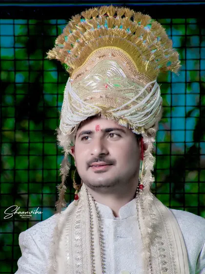 A handsome portrait of the groom in his wedding turban, ready for the ceremony.