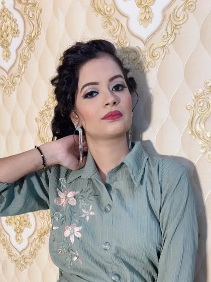 Another pose from the client with the modern light green outfit.