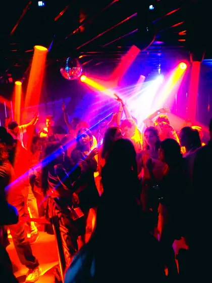 A snapshot of the dance floor, lost in the lights and found in the music. This is the energy I create.