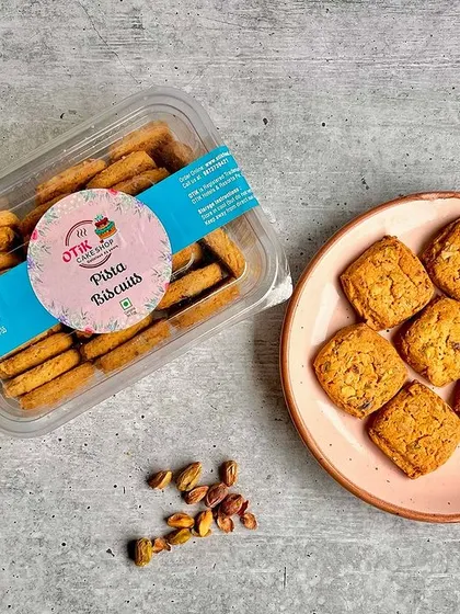 A box of my pista biscuits. These pistachio cookies are another one of my classic, freshly baked treats, perfect for sharing.
