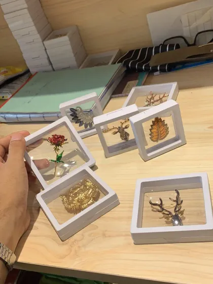 It's all about the details. These are some of the custom brooches and lapel pins we use to add a final, personalized touch to our suits and sherwanis.