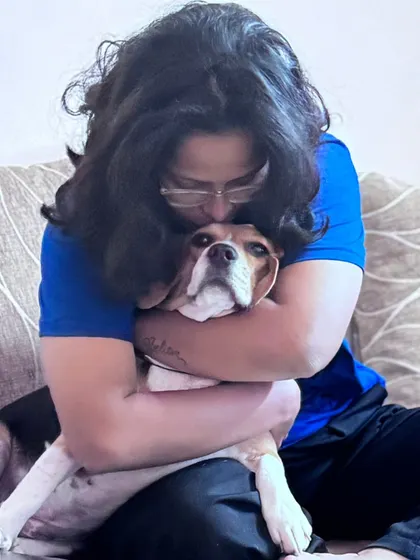 A gentle hug and a kiss for this sweet Beagle. Physical affection, when welcomed by the pet, is a powerful way to communicate safety and care. I always let the pet lead these interactions.