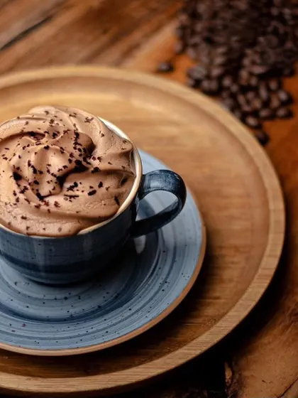 A decadent cup of our hot chocolate, topped with a generous swirl of chocolate cream. The perfect pick-me-up.