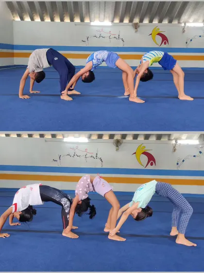 Our boys and girls working on their back flexibility with partner bridges. This is a fun and effective way to build strength and flexibility together.