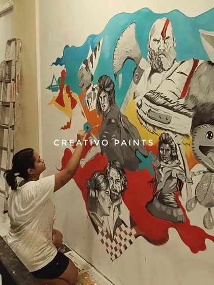 A shot of me working on the finer details of the mural. Each character gets individual attention to ensure the colors and shading are just right.