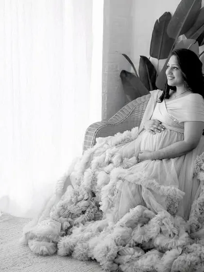 A black and white version of our boho-themed shoot, showing the versatility of the setup. The monochrome tones highlight the textures of the gown and decor.