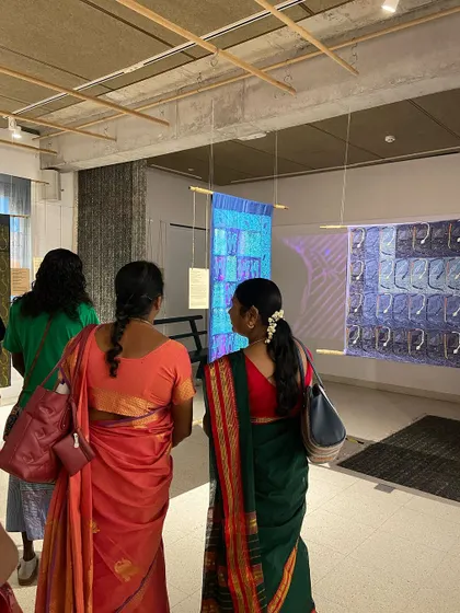 Glimpses from our "We Together Work" exhibition, where hand-printed textiles hang like art. These panels, created with the Bábbarra Women's Centre, tell ancestral stories through the medium of fabric.