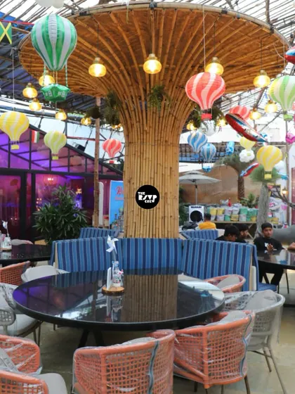The party venue was decorated with hot air balloon lanterns hanging from the ceiling, adding to the 'Around the World' travel theme.