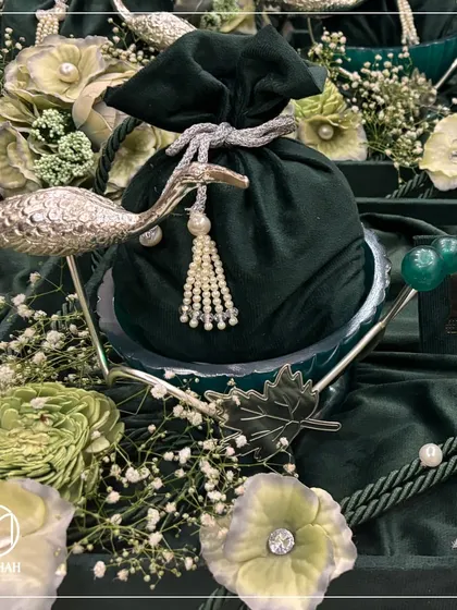 A close-up of the Heron Bowl wedding favour. The heron, a symbol of peace and longevity, makes this an incredibly meaningful gift for guests as they celebrate a new beginning.