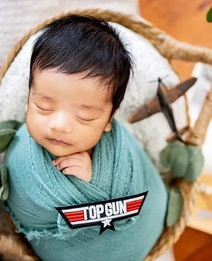 When dad's a pilot, we have to do a Top Gun theme. I love incorporating personal touches and hobbies into my newborn sessions to make them extra special for your family.