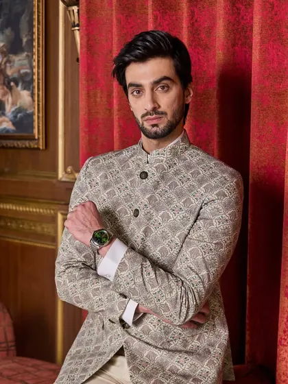The bandhgala is a timeless classic. Here, I've used a geometric print fabric to create a piece that feels both traditional and sharp, ideal for the 'dulhekabhai' or any distinguished wedding guest.