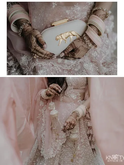 A close-up on the bride's accessories, including her unique clutch and traditional kalire. We pay attention to the details that complete the bridal look.