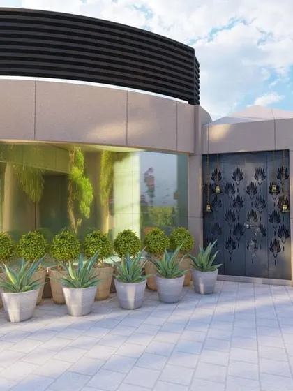 This terrace design exudes sophistication with its clean lines and curated greenery. We used a row of identical planters to create a structured look, leading to a serene space with a beautiful bonsai tree and flowering bougainvillea.