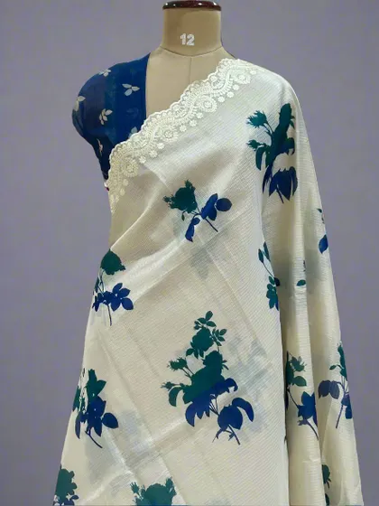 A close-up of the Kota checks saree with blue and green floral prints.