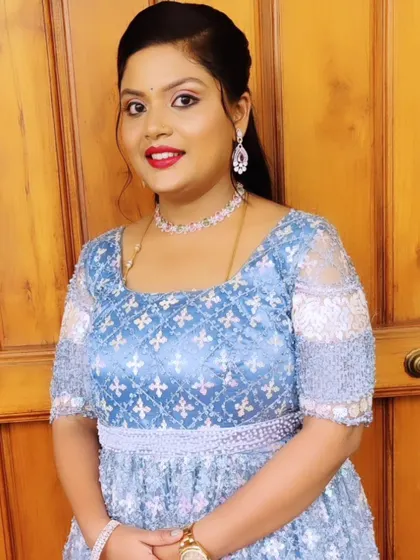 This client's reception gown in powder blue was so lovely. I chose a classic red lip for a pop of colour and a clean, elegant makeup look.