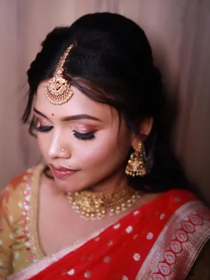 A close-up of Rachana's makeup. The soft smokey eye and neutral lip are perfect for a daytime event.