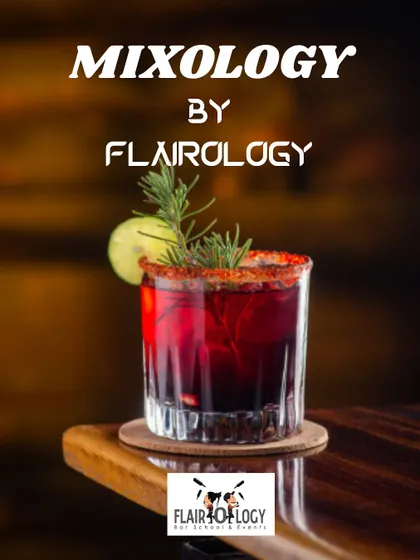 Mixology by Flairology. This image of a dark, complex cocktail garnished with rosemary and lime represents our dedication to the craft.
