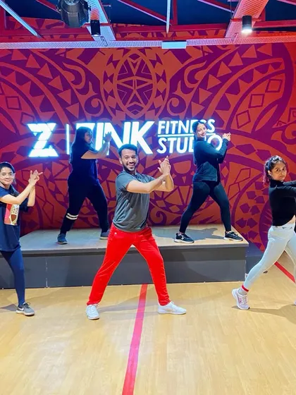 Posing on the stage after a great class. This space is for everyone to feel like a performer and have their moment to shine.