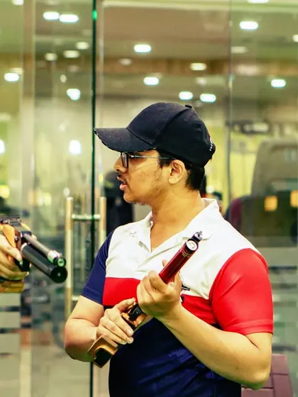 Sometimes all it takes is a little direction to unlock your potential. Here, one of our coaches provides hands on guidance to a young shooter, ensuring she learns the correct and safe way to handle an air pistol.