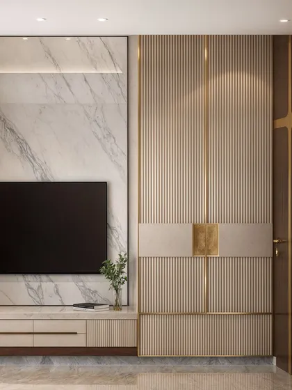 A master bedroom featuring a sophisticated combination of marble, fluted panels, and gold accents on the TV and wardrobe wall.