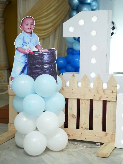 Personalization is key. We include life-sized cutouts of the birthday boy, like this one, to make the celebration feel truly special and unique.