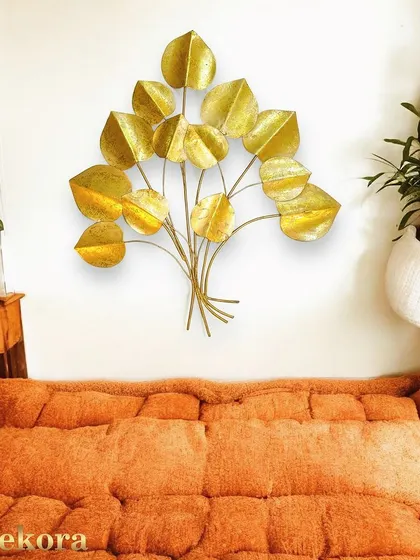 This golden leaf bouquet is a simple yet stunning piece of wall decor.