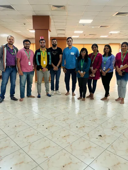 Another group photo from the corporate wellness session, showing the team feeling refreshed and centered.