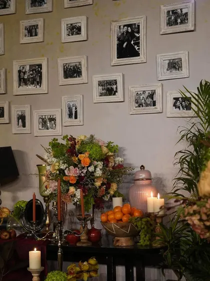 Another view of the photo wall, showing how it creates a personal and heartwarming corner for guests to enjoy.
