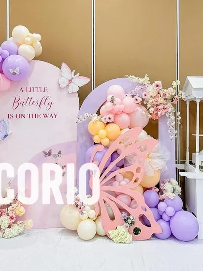 To complement the main backdrop, I can provide themed props like this white candy cart. It adds another focal point to the party and is perfect for displaying cakes, desserts, or party favors.