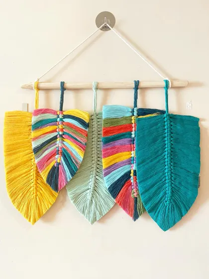A five-leaf wall hanging with a mix of solid and variegated cords. The rainbow-colored leaves are always a fun challenge to create.