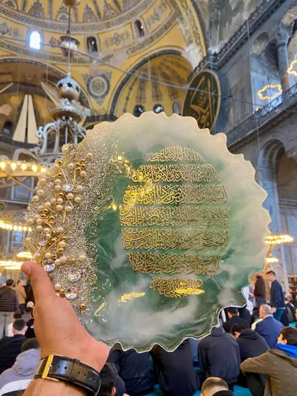 Another photo from my visit to Hagia Sophia, this time with a different Ayat al-Kursi piece. Being in such a spiritual place with my art in hand is a humbling experience that fuels my creativity.
