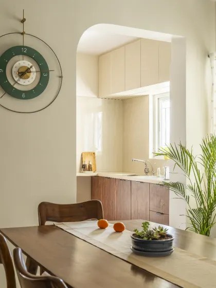 A simple yet elegant kitchen entryway at the Sobha Daffodil project. The arched opening and clean, woody aesthetic set a warm and welcoming tone for the heart of the home.