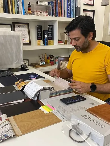 Work isn't work when you love what you do. A typical day at the office involves diving deep into fabric books and material samples to find the perfect combination for a project.