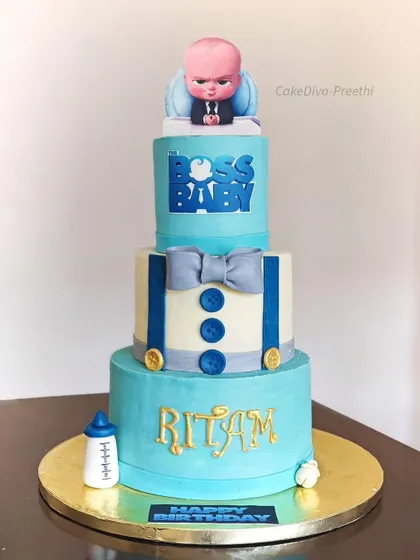 This view shows the clean lines and sharp edges I achieve even on very tall, multi-tiered cakes. Every detail, from the buttons to the lettering, is carefully crafted.