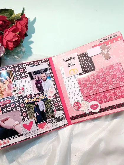 This page includes a pocket for extra photos or notes, with a "Wedding Bliss" theme.