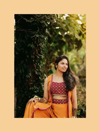 A stylish portrait of the bride in her modern Haldi outfit.