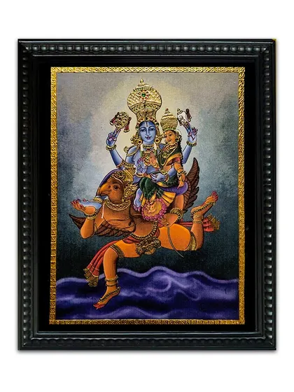 This canvas painting of Vishnu and Lakshmi riding on Garuda is beautifully enhanced with Tanjore-style gold work. The fusion of techniques creates a dynamic and divine artwork, perfect for any spiritual space.