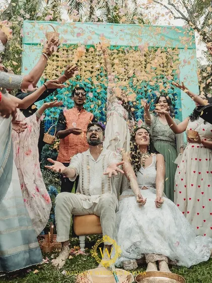We designed this Haldi and Mehendi with multiple unique color palettes. The decor featured everything from stunning yellow and blue floral arrangements to lively orange accents for a truly dynamic celebration.