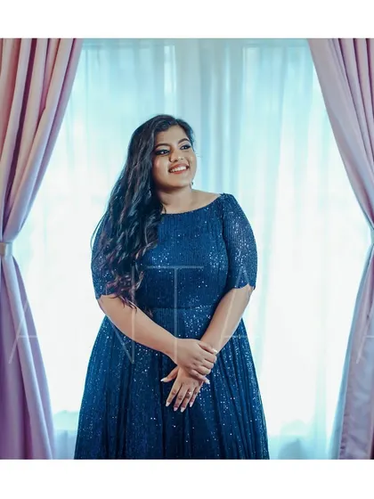 Another angle of the gorgeous bride in her custom navy sequin gown. The fit and flare of the gown are designed to be both comfortable and flattering.