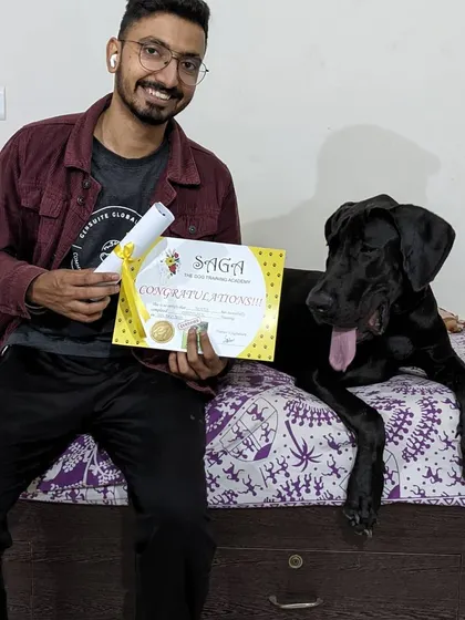 Rover and his dad celebrating their training success. Rover has come such a long way, and it's all thanks to his parent's dedication and our positive training methods.