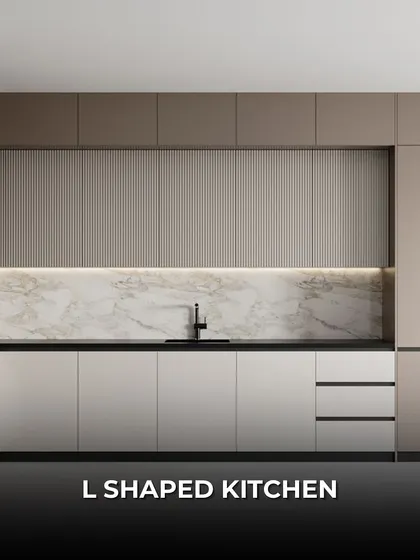 An L-shaped kitchen is a versatile and popular choice, offering an efficient work triangle and plenty of counter space. This design features a clean, two-tone look with handleless cabinets.
