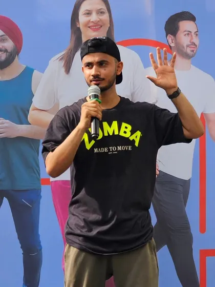 Guiding the participants through a warm-up routine at the Narayana Health event. We make sure our instructions are clear and the energy is high from start to finish.
