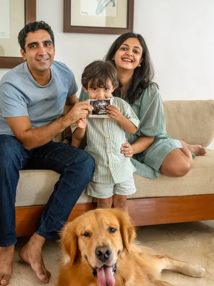Just a boy and his bestie, with a special announcement. This family session with Sumer and Ziggy celebrates their bond while also sharing the news of a new baby on the way. Including your pet in your pregnancy announcement makes the story complete.