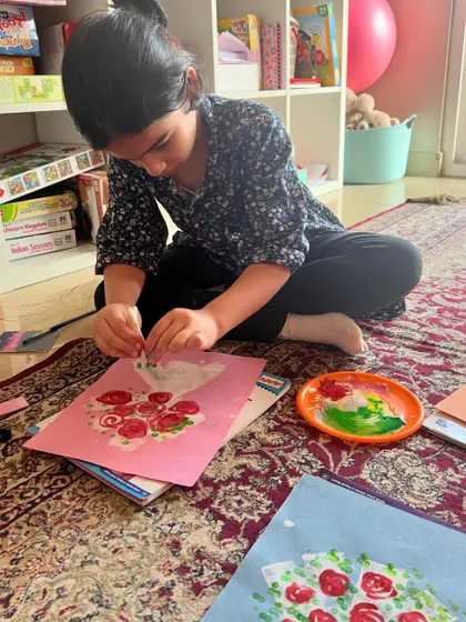 Another little one putting the finishing touches on her bouquet. We use simple techniques that yield beautiful results.