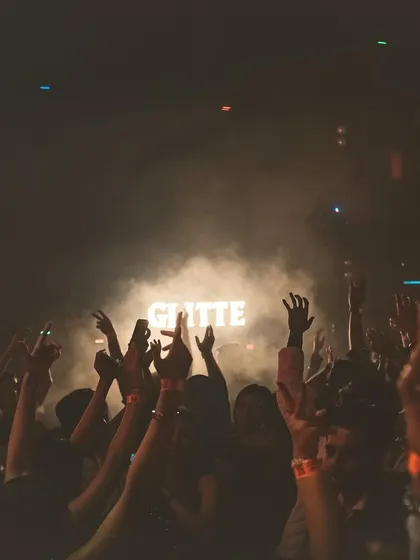 Hands in the air at Glitte Superclub. This is the universal sign that the music is hitting just right.